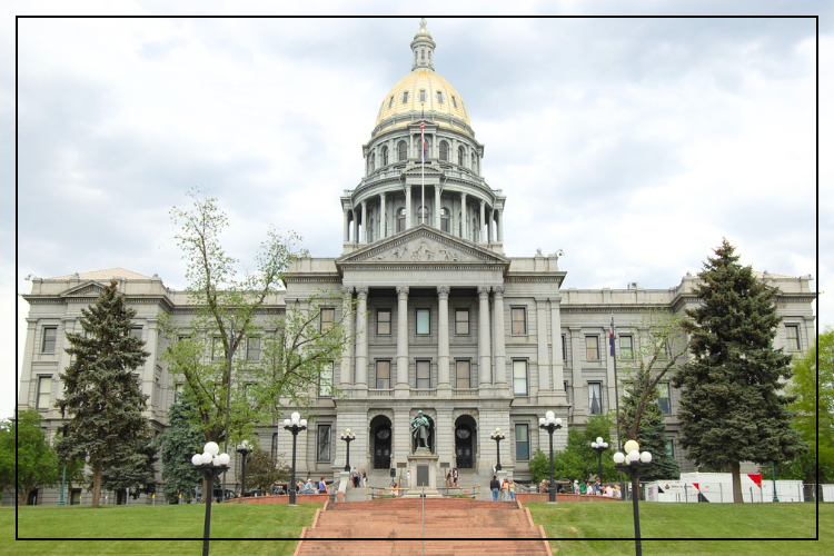 Photo of the Colorado state capitol building looking at the entrance