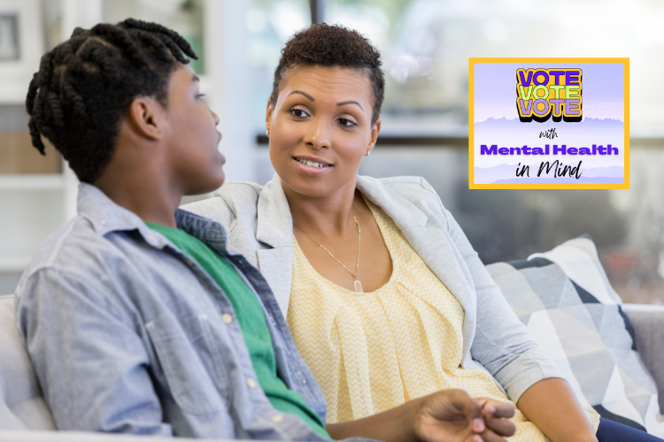 A Black mother and teen son sit on a sofa talking