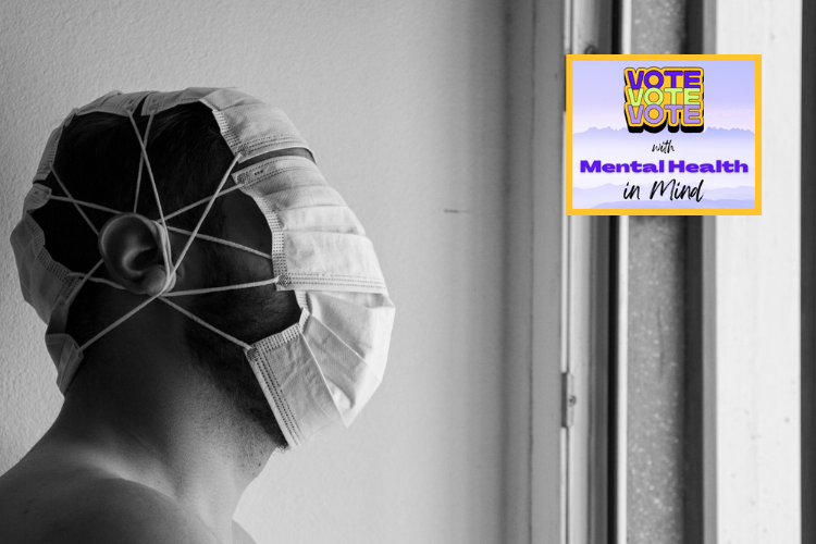 Side view of a man wearing medical masks covering his entire head. He faces a barred window.