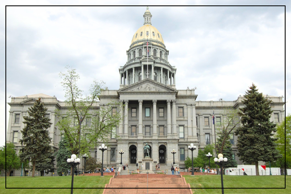 Photo of the Colorado state capitol building looking at the entrance