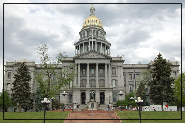 Photo of the Colorado state capitol building looking at the entrance
